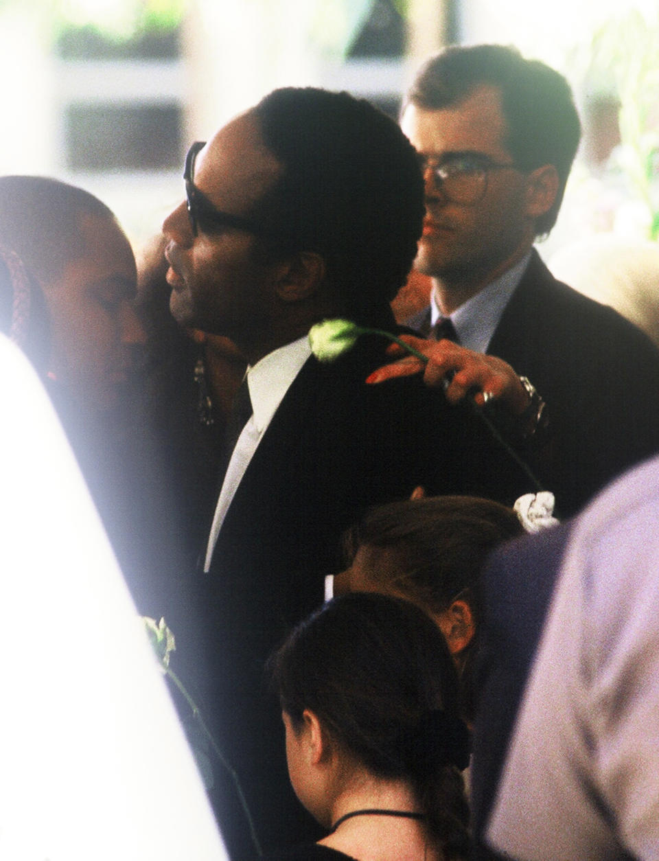 O.J. Simpson was present at both the vigil and the funeral — captured here on June 16, 1994 — preceding his arrest relative to the murders.