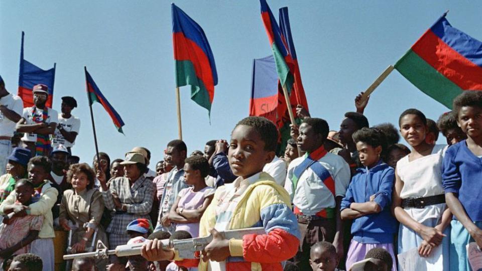 Thousands of South West Africa People's Organisation (SWAPO) enthusiasts chant anthems of freedom, at a gathering to commemorate Swapo's 22nd commemoration of their guerilla warfare against South Africa's continued rule over Namibia, on August 28, 1988 in Windhoek.