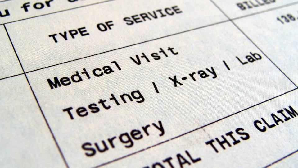 Macro of Medical Bill includes tesing/x-ray/lab/surgery (PHOTO: Getty Images) (Lbodvar/Getty Images)