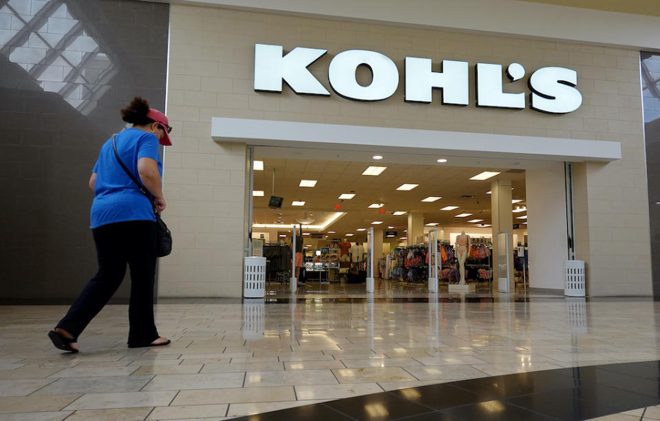 DORAL, FLORIDA - JUNE 07: A person walks near a Kohl's department store entranceway on June 07, 2022 in Doral, Florida. Kohl’s announced that it has entered into exclusive negotiations with Franchise Group, which is proposing to buy the retailer for $60 per share. (Photo by Joe Raedle/Getty Images)