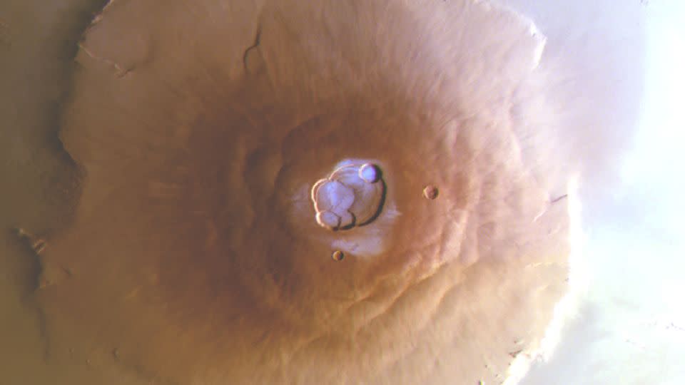 This image of Olympus Mons was obtained in the early morning (7:20 a.m. Local Solar Time) by the Stereo Camera aboard ESA’s Mars Express, as part of new research revealing water frost for the first time near Mars’s equator — a part of the planet where it was thought impossible for frost to exist. - ESA/DLR/FU Berlin