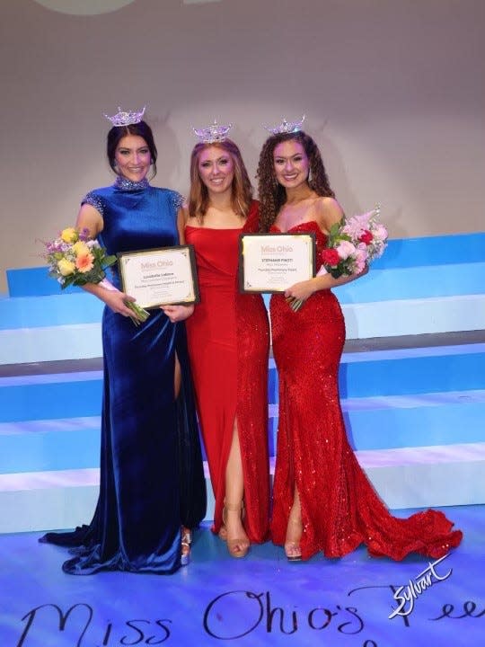 Miss Greater Cleveland Lucabella LaEace, 20, of Cincinnati, left, health & fitness preliminary winner Thursday at Miss Ohio, Miss Ohio Madison Miller, center, and Miss Shawnee Stephanie Finoti, 21, of Columbus, preliminary talent winner, pose at the Renaissance Theatre.