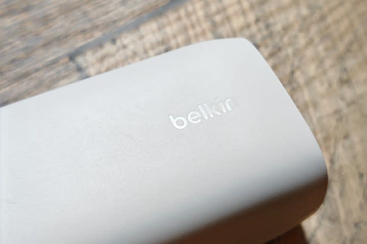 The Belkin logo on a white charger.