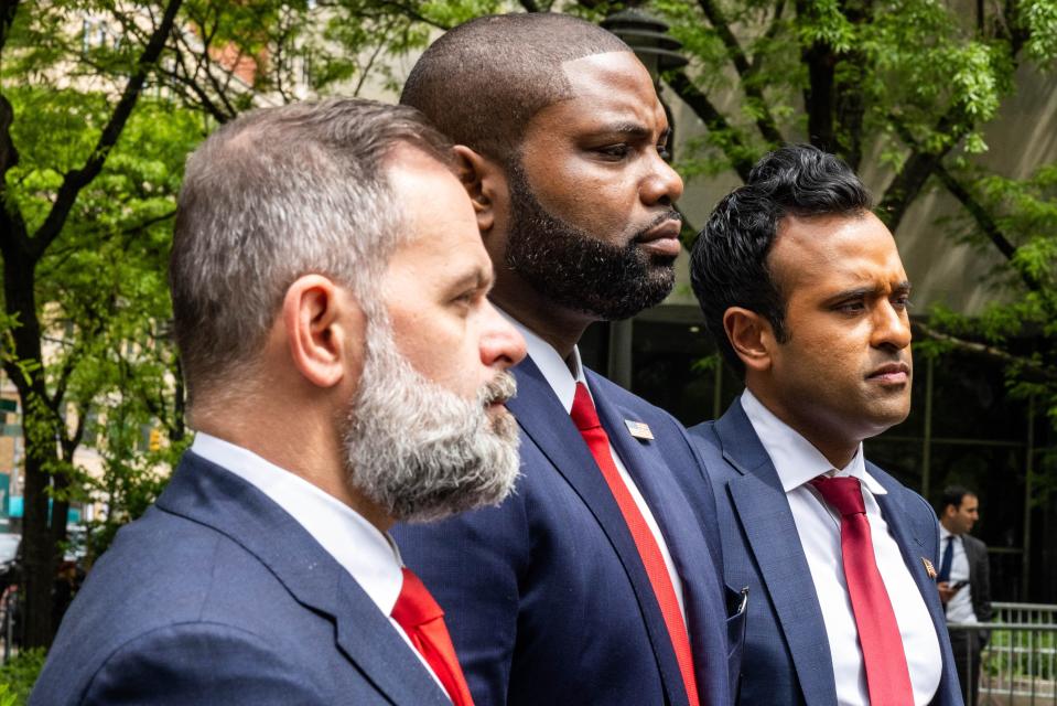 (L-R) Republican Representatives of Florida, Cory Mills and Byron Donalds, and former presidential candidate Vivek Ramaswamy speak to the press outside of the Manhattan Criminal Court in New York on May 14, 2024, as former President Donald Trump attends his trial for allegedly covering up hush money payments.