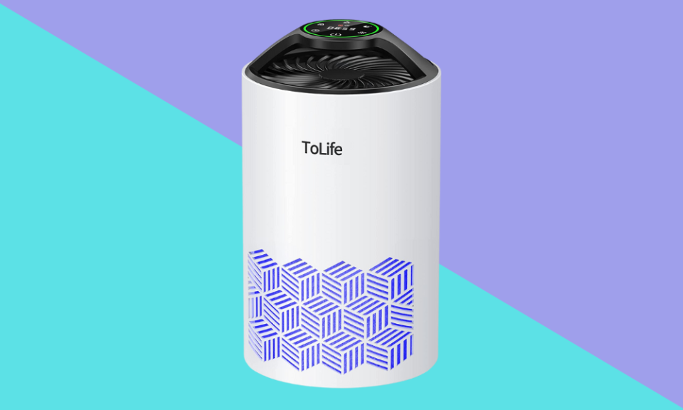 the white air purifier on a teal and purple background