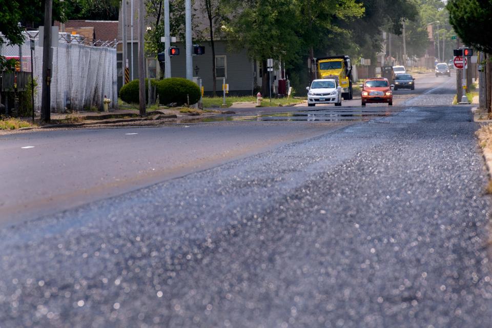 Fresh oil and new blacktop covers part of Lincoln Avenue as the busy South Peoria one-way thoroughfare undergoes some renovation. Lincoln's westbound counterpart Howett Street is also being upgraded.