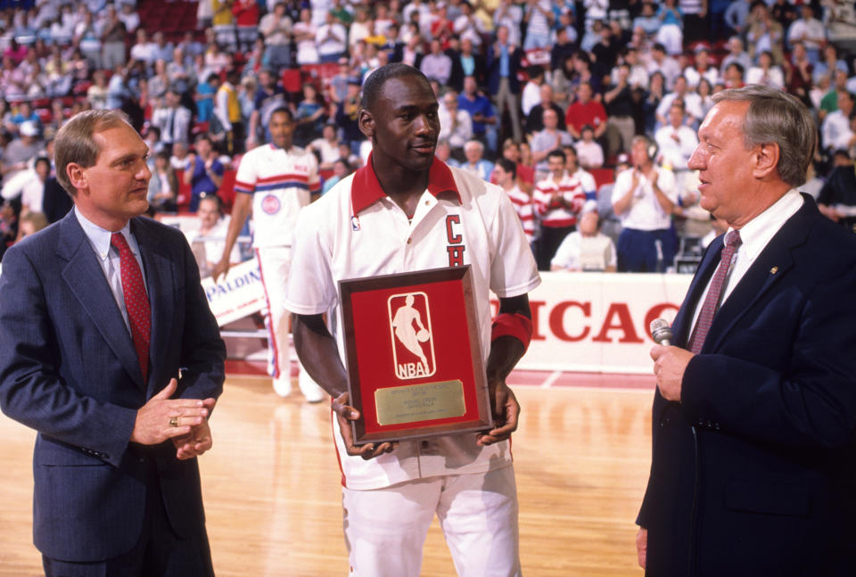 Basketball: NBA Playoffs: Chicago Bulls Michael Jordan (23) victorious, holding National Basketball Association's Defensive Player of the Year Award trophy before Game 4 vs Detroit Pistons at Chicago Stadium. 
Chicago, IL 5/15/1988
CREDIT: Bill Smith (Photo by Bill Smith /Sports Illustrated via Getty Images)
(Set Number: X36562 TK3 R3 F14 )