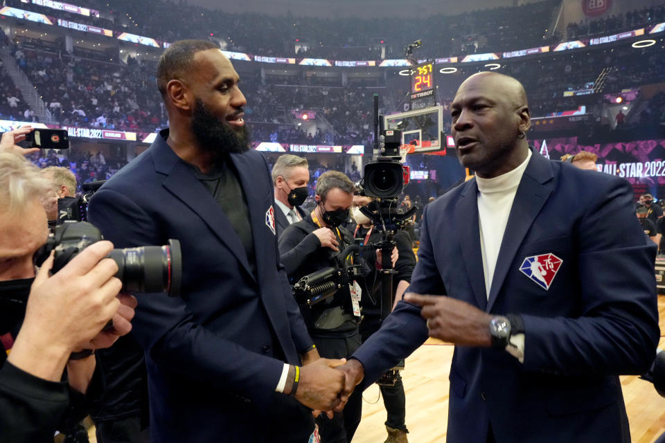 CLEVELAND, OHIO - FEBRUARY 20: (L-R) LeBron James and Michael Jordan attend the 2022 NBA All-Star Game at Rocket Mortgage Fieldhouse on February 20, 2022 in Cleveland, Ohio. NOTE TO USER: User expressly acknowledges and agrees that, by downloading and or using this photograph, User is consenting to the terms and conditions of the Getty Images License Agreement.  (Photo by Kevin Mazur/Getty Images)