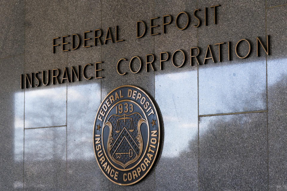 FILE - The Federal Deposit Insurance Corporation seal is shown outside its headquarters, March 14, 2023. The White House announced Thursday, June 13, 2024, that President Joe Biden will nominate Christy Goldsmith Romero to replace Martin Greunberg as head of the FDIC. (AP Photo/Manuel Balce Ceneta, File)