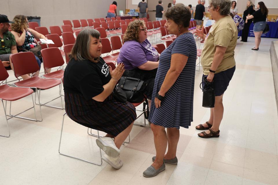 Jennifer Pepper, President and CEO of Choices Center for Reproductive Health, talks to community members in Carbondale, Illinois in September 2022