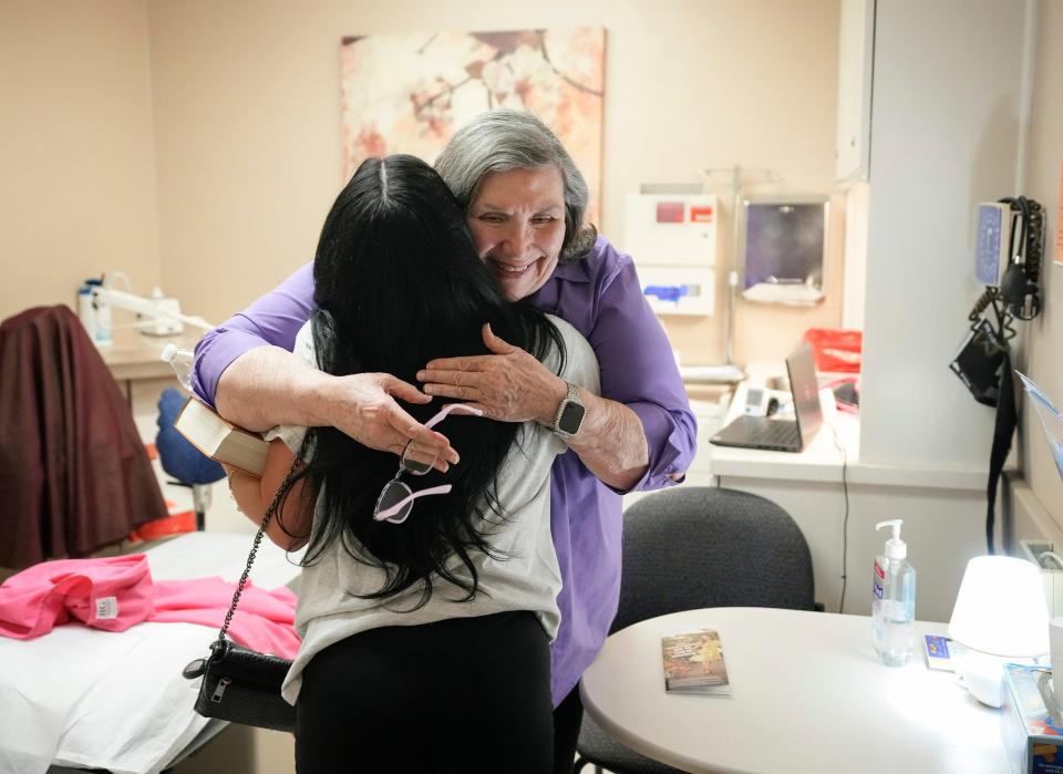 Advanced Nurse Practitioner Ginger Ridout hugs a patient at the Austin Women’s Health Center in Austin, Texas, Thursday June 6, 2024.