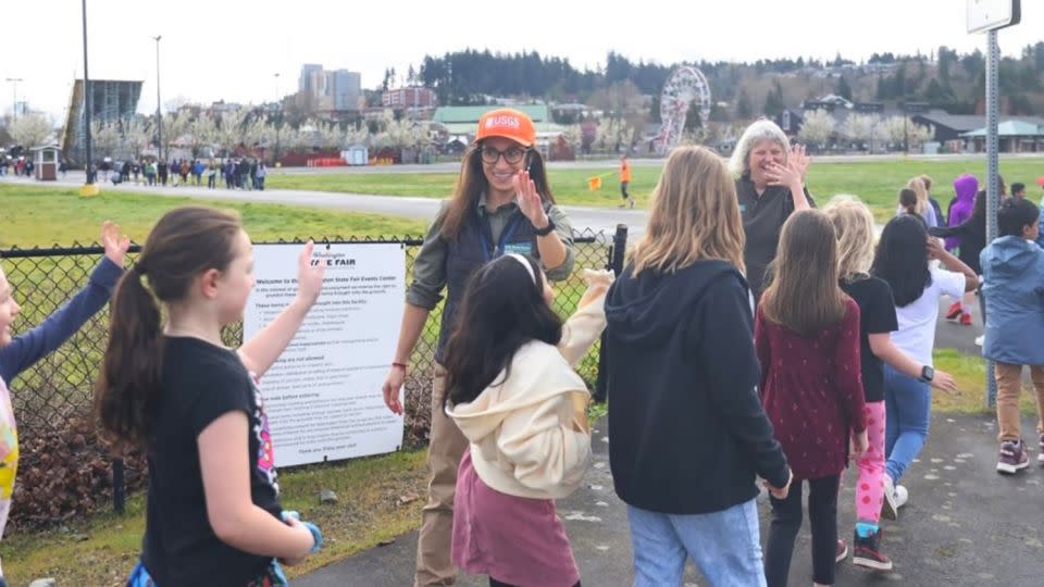 During a March drill, students walk to the Washington State Fairgrounds in Puyallup to practice evacuating from a lahar that could be generated by Mount Rainier. - U.S. Geological Survey Cascades Volcano Observatory