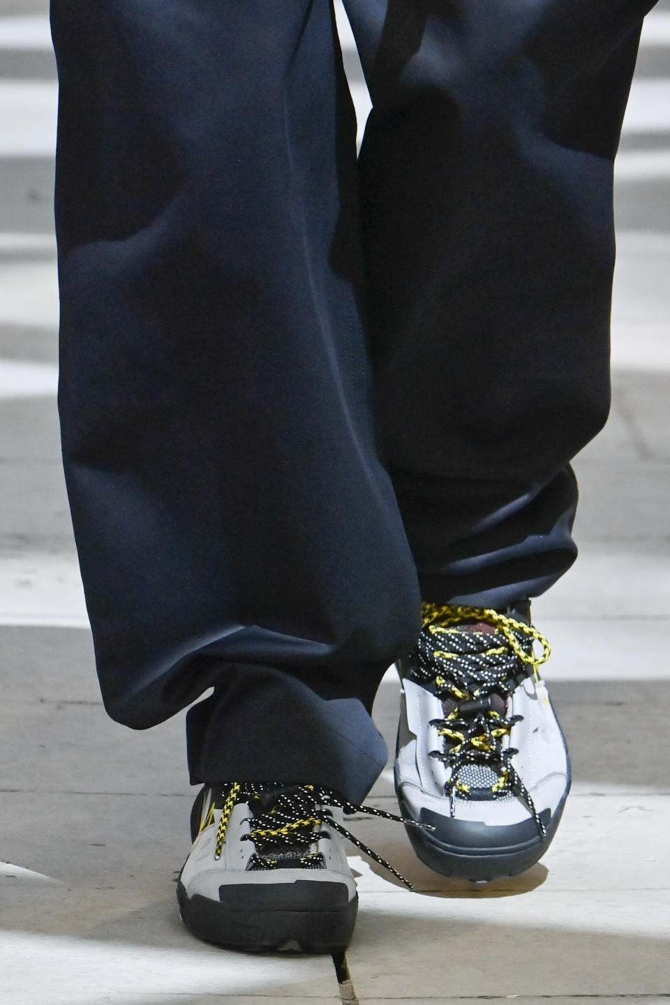 PARIS, FRANCE - JUNE 23: A model walks the runway during the Sacai Ready to Wear Spring/Summer 2025 fashion show as part of the Paris Men Fashion Week on June 23, 2024 in Paris, France. (Photo by Victor VIRGILE/Gamma-Rapho via Getty Images)