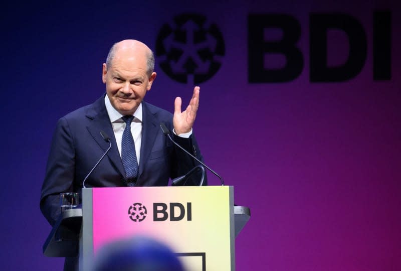 German Chancellor Olaf Scholz speaks at the Day of German Industry 2024 organized by the Federation of German Industries (BDI). The BDI's two-day future conference with representatives from business, politics, science and society is being held this year under the motto "Cohesion in polarized worlds". Bernd von Jutrczenka/dpa