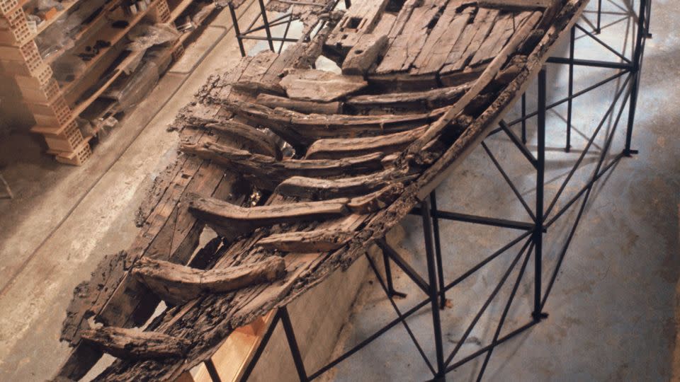 The Kyrenia ship's hull is seen shortly after it was raised from the seabed and reassembled. - Kyrenia Ship Excavation