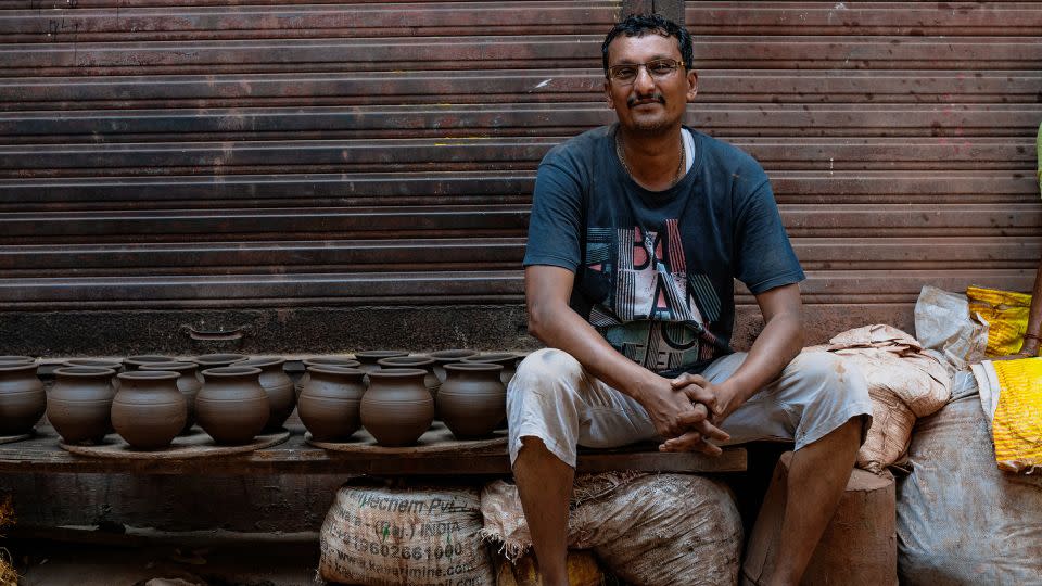 Dhanshuk Purshottamwala, 42, poses for a picture during an interview with CNN in Dharavi on April 14. - Noemi Cassanelli/CNN