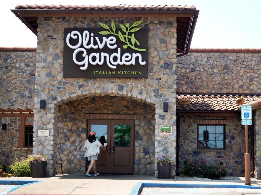 A sign hangs on the front of an Olive Garden restaurant on June 22, 2023 in Chicago, Illinois.