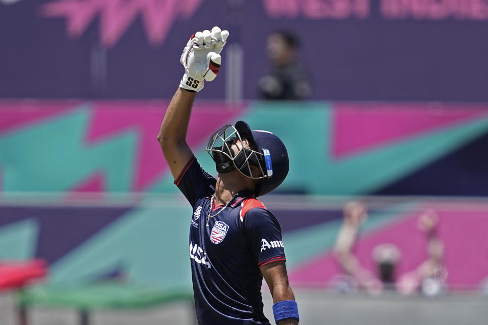 United States' captain Monank Patel looks skywards to celebrate scoring fifty runs during the ICC Men's T20 World Cup cricket match between United States and Pakistan at the Grand Prairie Stadium in Grand Prairie, Texas, Thursday, June 6, 2024. (AP Photo/Tony Gutierrez)