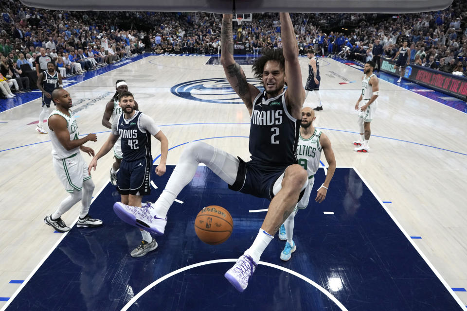 DALLAS, TEXAS - JUNE 14: Dereck Lively II #2 of the Dallas Mavericks dunks the ball in Game Four of the 2024 NBA Finals against the Boston Celtics at American Airlines Center on June 14, 2024 in Dallas, Texas. NOTE TO USER: User expressly acknowledges and agrees that, by downloading and or using this photograph, User is consenting to the terms and conditions of the Getty Images License Agreement. (Photo by Stacy Revere/Getty Images)