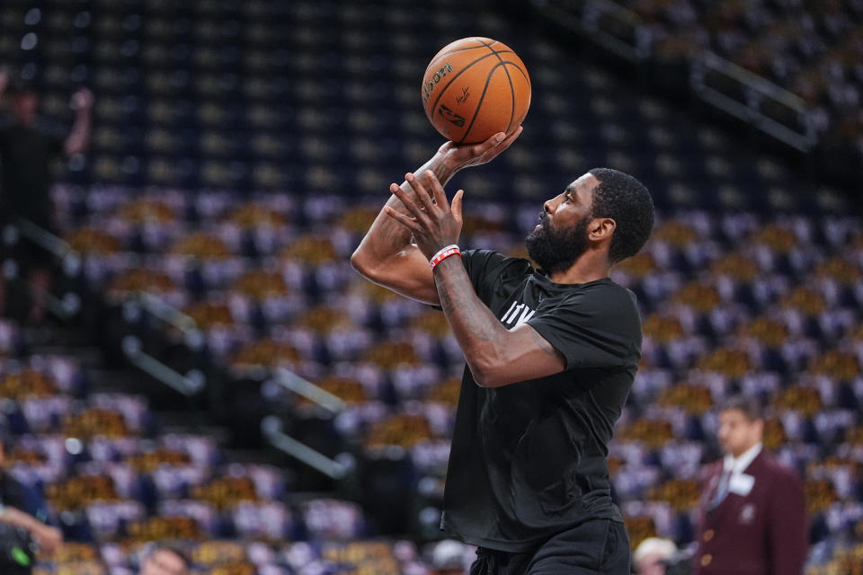 Dallas Mavericks guard Kyrie Irving works out prior to Game 4 of the NBA basketball finals against the Dallas Mavericks, Friday, June 14, 2024, in Dallas. (STF Photo/Julio Cortez)