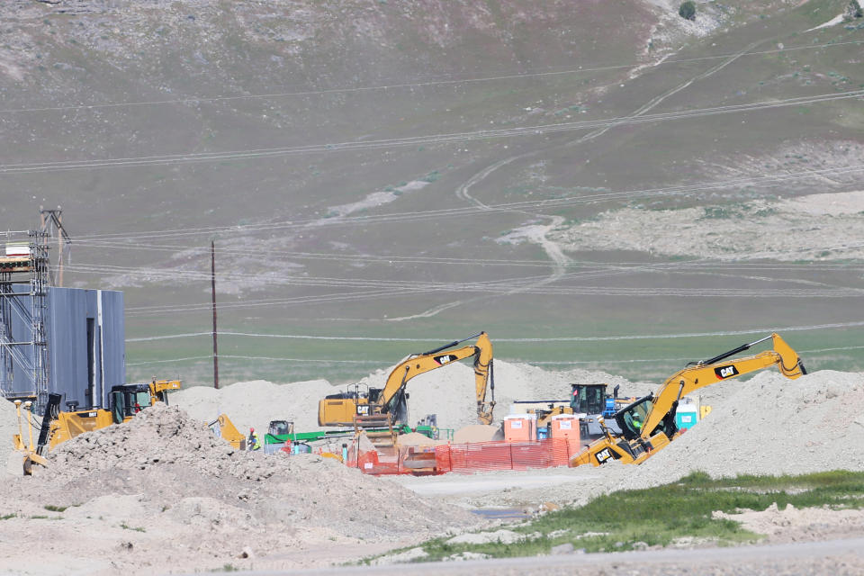 Heavy equipment excavates the site where a new Facebook data center is under construction in Eagle Mountain, Utah, U.S., May 14, 2019. Picture taken on May 14, 2019.   REUTERS/George Frey