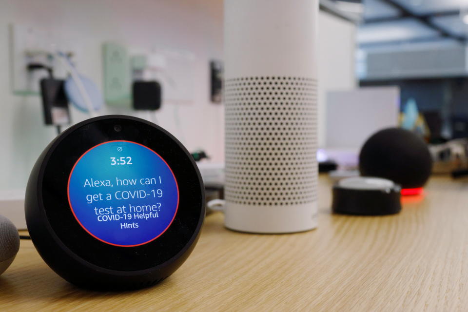 (L-R) An Amazon Echo Spot, an Amazon Echo Plus 1st Generation, an Amazon Echo Button and an Amazon Echo Dot 4th Generation sit among the smart devices being studied at the lab of Associate Professor of Computer Science and Executive Director of the Cybersecurity and Privacy Institute at Northeastern University David Choffnes at the Interdisciplinary Science and Engineering Complex at Northeastern University in Boston, Massachusetts, U.S., October 14, 2021. Picture taken October 14, 2021. REUTERS/Brian Snyder