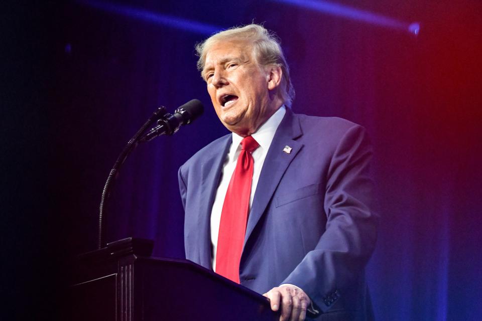 Former President Donald Trump speaks at a Turning Point Action event in Detroit.