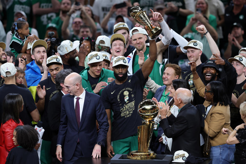 BOSTON, MASSACHUSETTS - JUNE 17: Jaylen Brown #7 of the Boston Celtics holds up the Bill Russell NBA Finals Most Valuable Player award after Boston's 106-88 win against the Dallas Mavericks in Game Five of the 2024 NBA Finals at TD Garden on June 17, 2024 in Boston, Massachusetts. NOTE TO USER: User expressly acknowledges and agrees that, by downloading and or using this photograph, User is consenting to the terms and conditions of the Getty Images License Agreement. (Photo by Adam Glanzman/Getty Images)