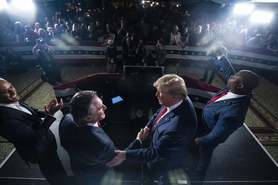 Laconia, NH - January 22 : Republican presidential candidate and former president Donald Trump speaks with Vivek Ramaswamy, North Dakota Gov. Doug Burgum, and Sen. Tim Scott (R-S.C.) at a campaign rally at the The Margate Resort in Laconia, NH on Monday, January 22, 2024. (Photo by Jabin Botsford/The Washington Post via Getty Images)