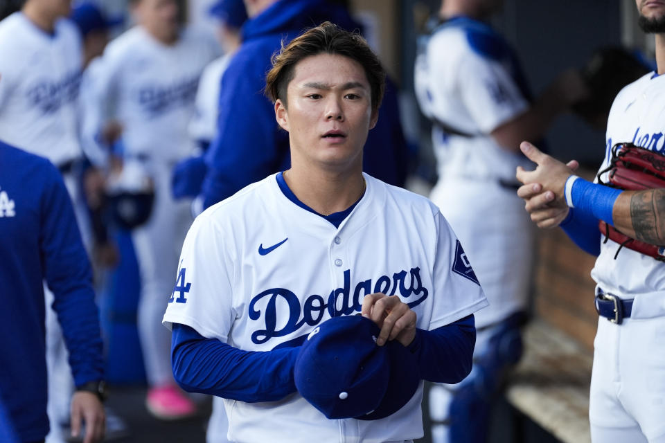 Yoshinobu Yamamoto is slated to undergo further testing after leaving Saturday's game after two innings. (AP Photo/Ashley Landis)