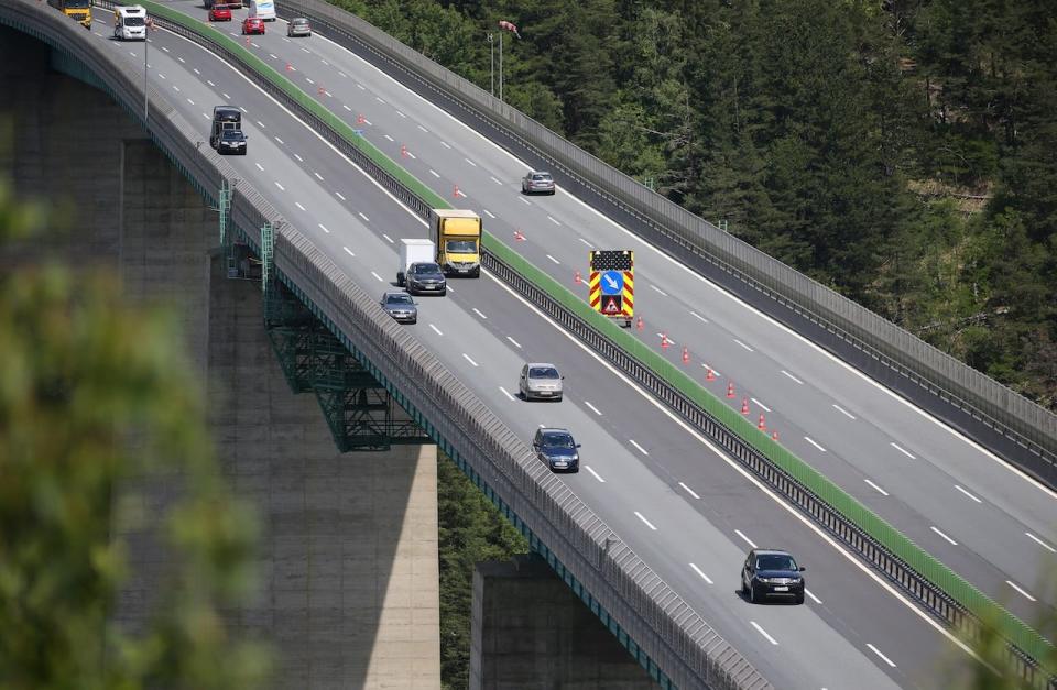 Cars drive just before the Brenner Pass over the Europabrücke bridge towards Italy.