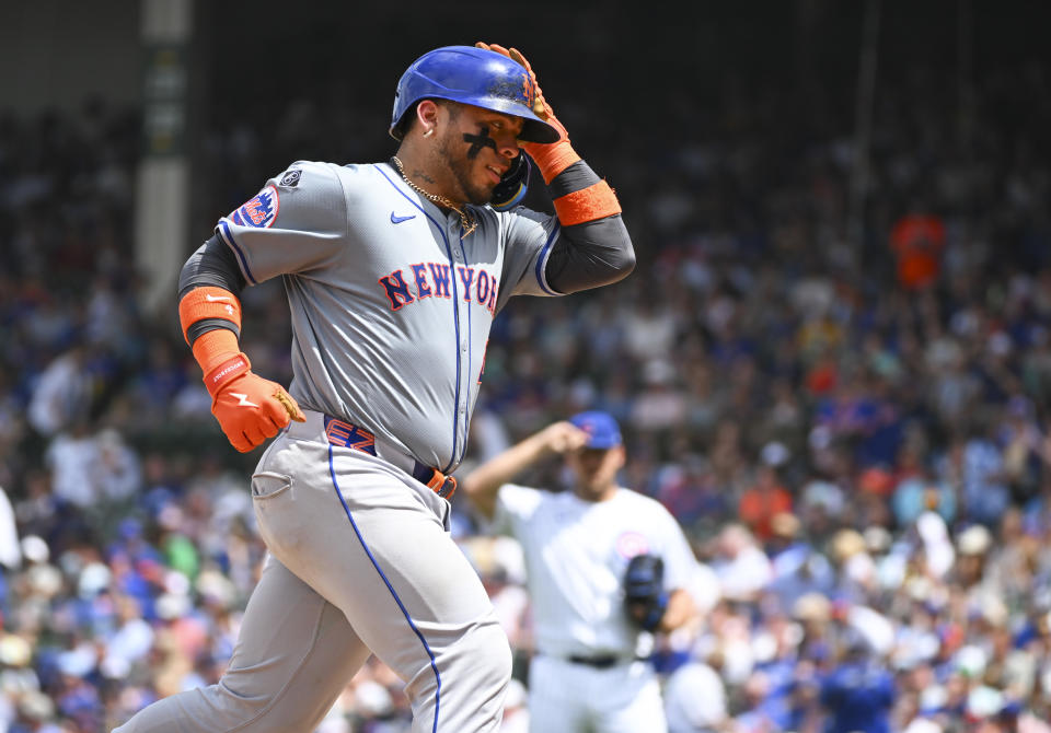 CHICAGO, ILLINOIS - JUNE 22: Francisco Alvarez #4 of the New York Mets hits a home run off of Jameson Taillon #50 of the Chicago Cubs during the fifth inning of a game at Wrigley Field on June 22, 2024 in Chicago, Illinois. (Photo by Nuccio DiNuzzo/Getty Images)