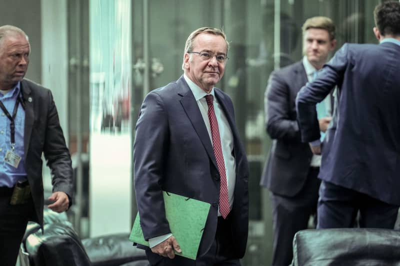 Boris Pistorius (C), Germany's Defence Minister, comes to the Bundestag's Defence Committee to present plans for a new military service. Kay Nietfeld/dpa