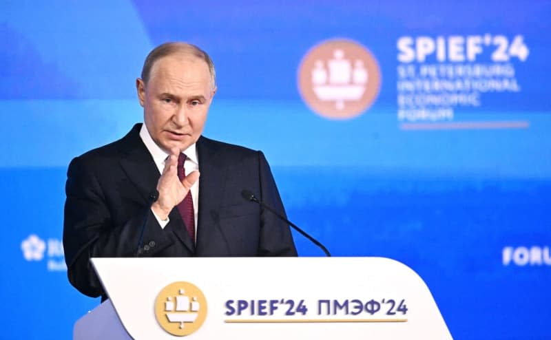 Russian President Vladimir Putin delivers a speech at the St. Petersburg International Economic Forum in St. Petersburg. -/Kremlin/dpa