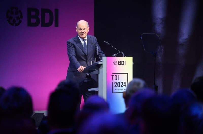 German Chancellor Olaf Scholz speaks at the Day of German Industry 2024 organized by the Federation of German Industries (BDI). The BDI's two-day future conference with representatives from business, politics, science and society is being held this year under the motto "Cohesion in polarized worlds". Bernd von Jutrczenka/dpa