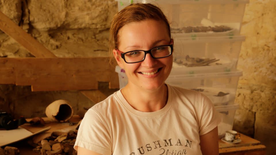 Egyptologist Veronika Dulíková appears on site at Abusir documenting a hieroglyphic inscription from the tomb of the official Idu. - Martin Frouz/Archive of Czech Institute of Egyptology; Faculty of Arts; Charles University