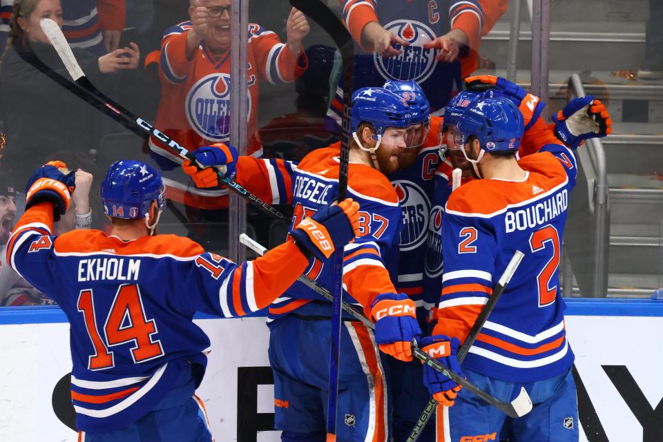 Edmonton Oilers center Connor McDavid (97) celebrates his goal with teammates in the second period against the Florida Panthers.