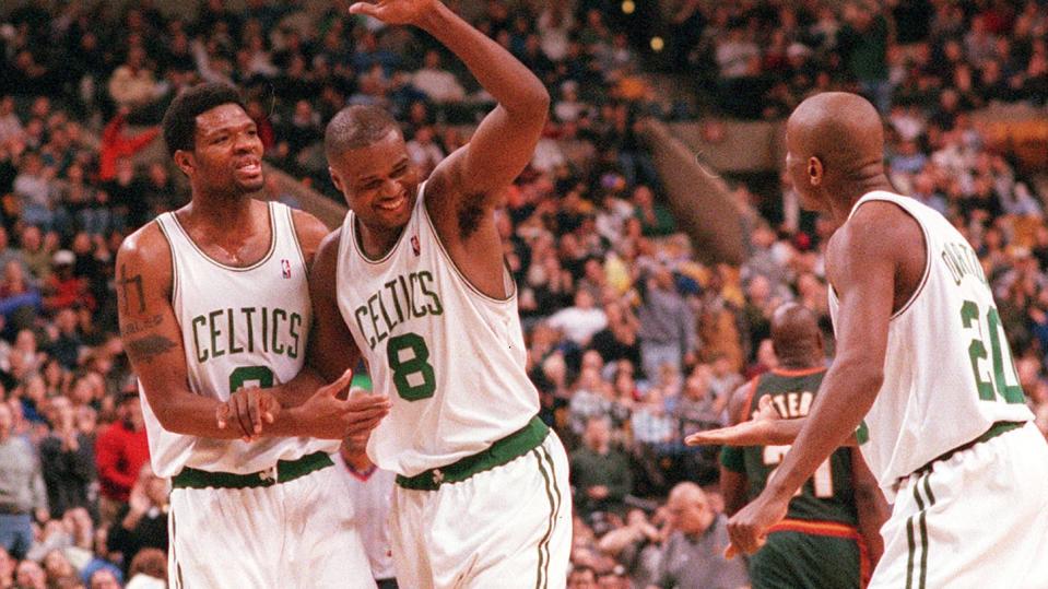 WALTER MCCARTY, ANTOINE WALKER AND DOUG OVERTON CELEBRATE WALKERS END OF THE HALF AT THE BUZZER 3 POINT SHOT 1-21-2000 STAFF PHOTO BILL BELKNAP SAVED PHOTO SATURDAY (Photo by Boston Herald/MediaNews Group/Boston Herald via Getty Images)