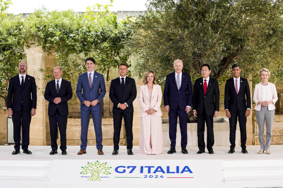 From left, Charles Michel, Olaf Scholz, Justin Trudeau, Emmanuel Macron, Giorgia Meloni, Joe Biden, Fumio Kishida,  Rishi Sunak and Ursula von der Leyen. (Alex Brandon / AP)