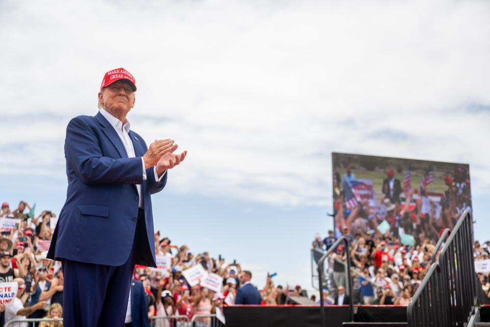 Republican presidential candidate, former U.S. President Donald Trump greets supporters upon arrival for his campaign rally at Sunset Park on June 09, 2024 in Las Vegas, Nevada