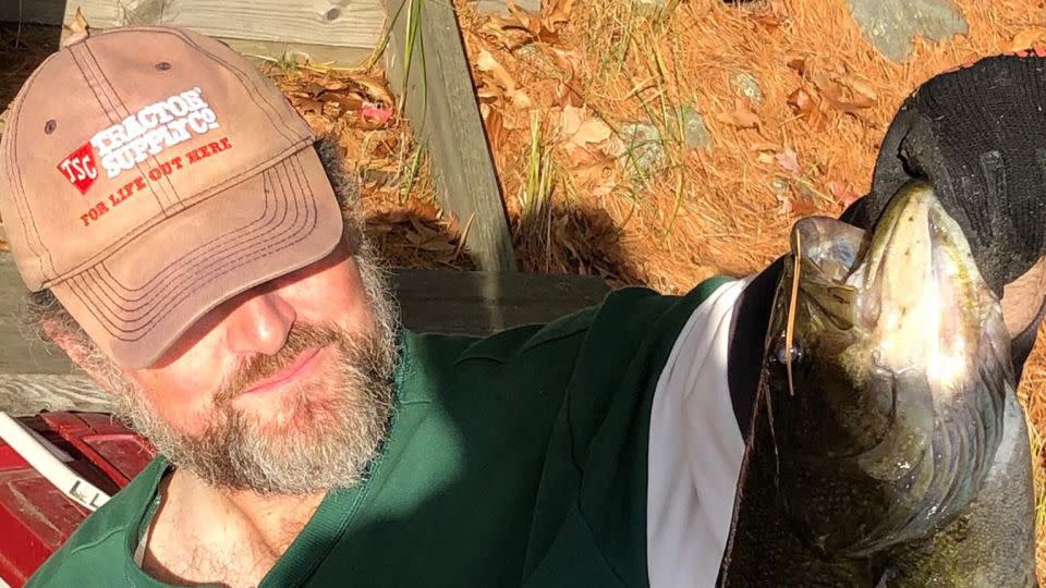 Perry shows off a his catch while wearing the hat from Tractor Supply - Courtesy David M Perry