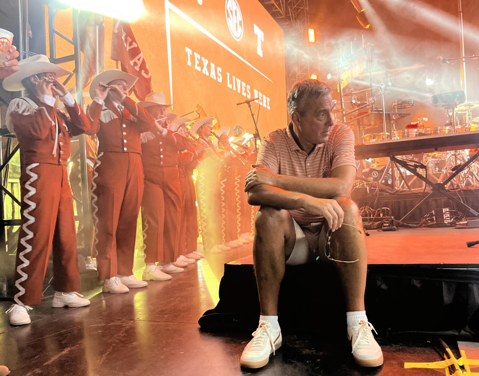 Texas athletic director Chris Del Conte takes a break during a party to celebrate the school's move to the SEC. (Yahoo Sports)