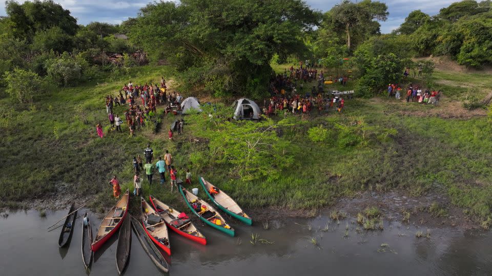 The expedition team camping at a fishing village. Learning from local fishermen is an integral part of understanding the health of the catchment waters. - Johann Vorster