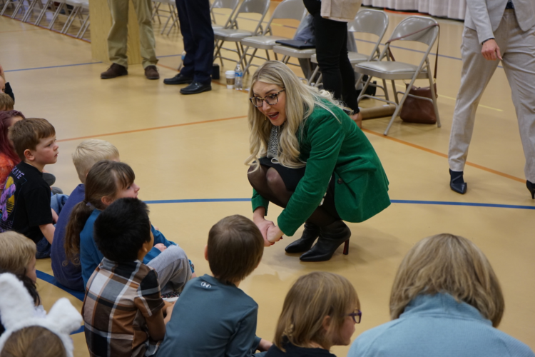 Wyoming Superintendent of Public Instruction Megan Degenfelder chats with K-3 students at Gannett Peak Elementary in Lander on March 19, 2024. (Katie Klingsporn/WyoFile)