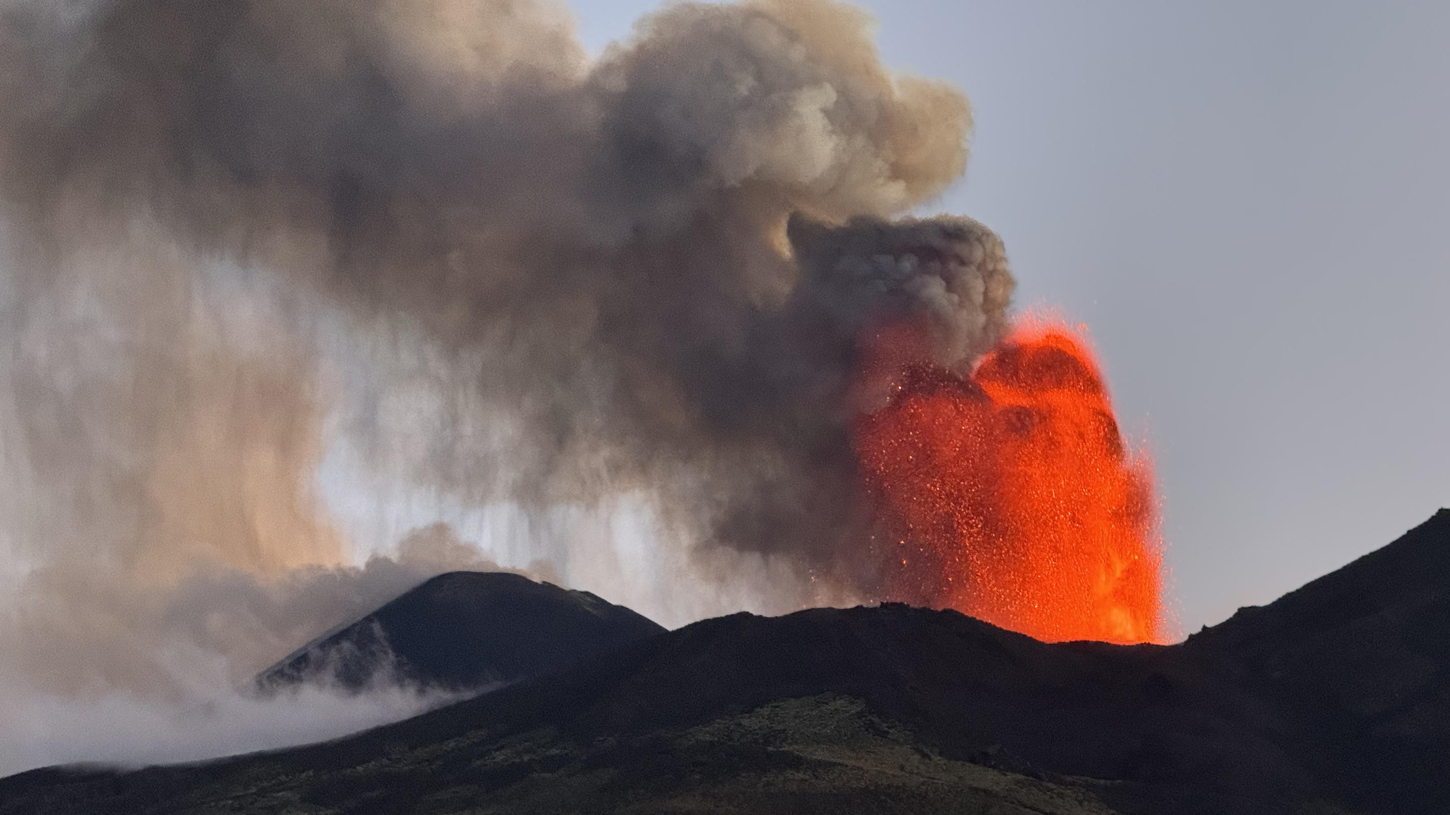 A picture shows the eruption of the Mount Etna volcano on July 5, 2024 in Sicily. (Giuseppe Distefano/Etna Walk/AFP via Getty Images)