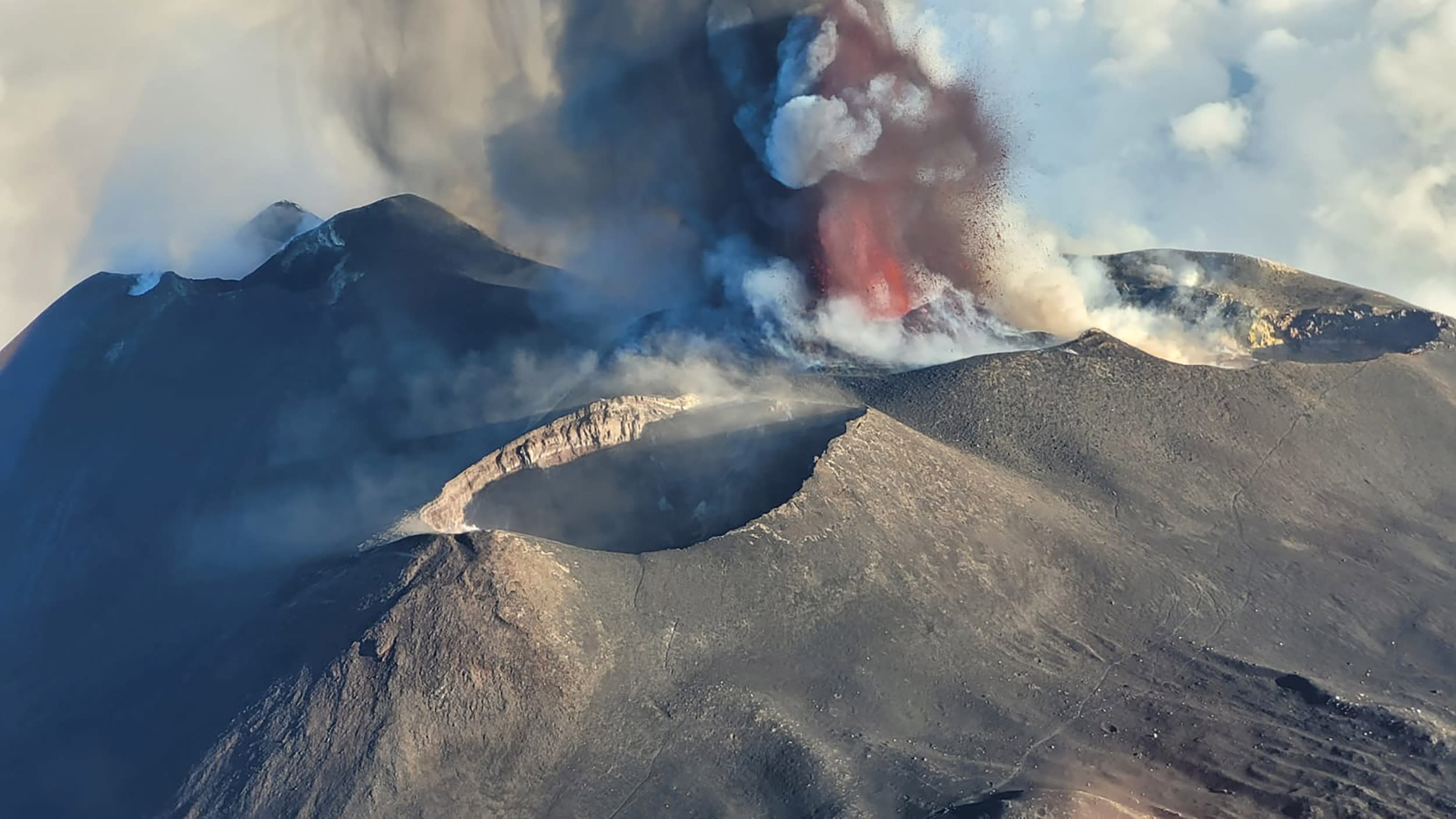 Ash spewing from a volcano.