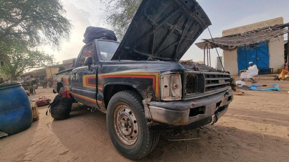 A vehicle with its bonnet up