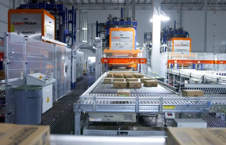 Boxes on rollers at a Walmart automated distribution center