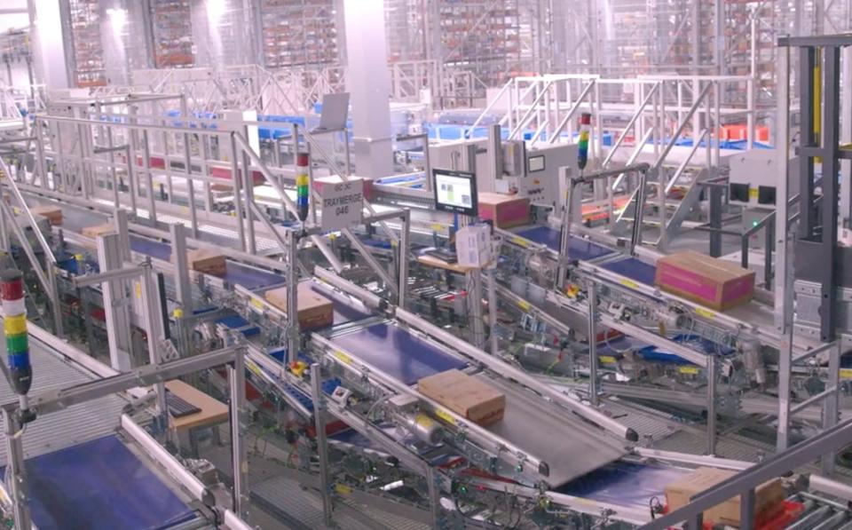 Boxes on conveyer belts at a Walmart automated distribution center