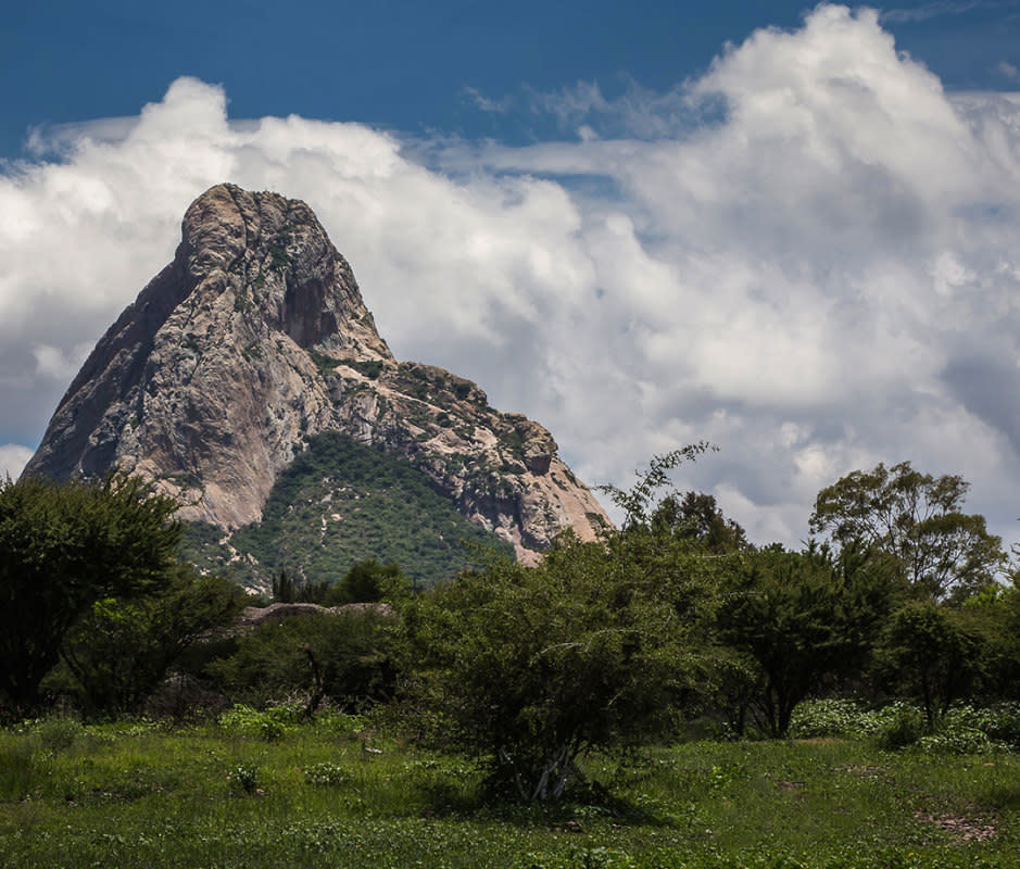 Towering over its namesake colonial town, 1,421-foot Peña de Bernal is one of the world's tallest monoliths—and the area's bucket list summit trek. 